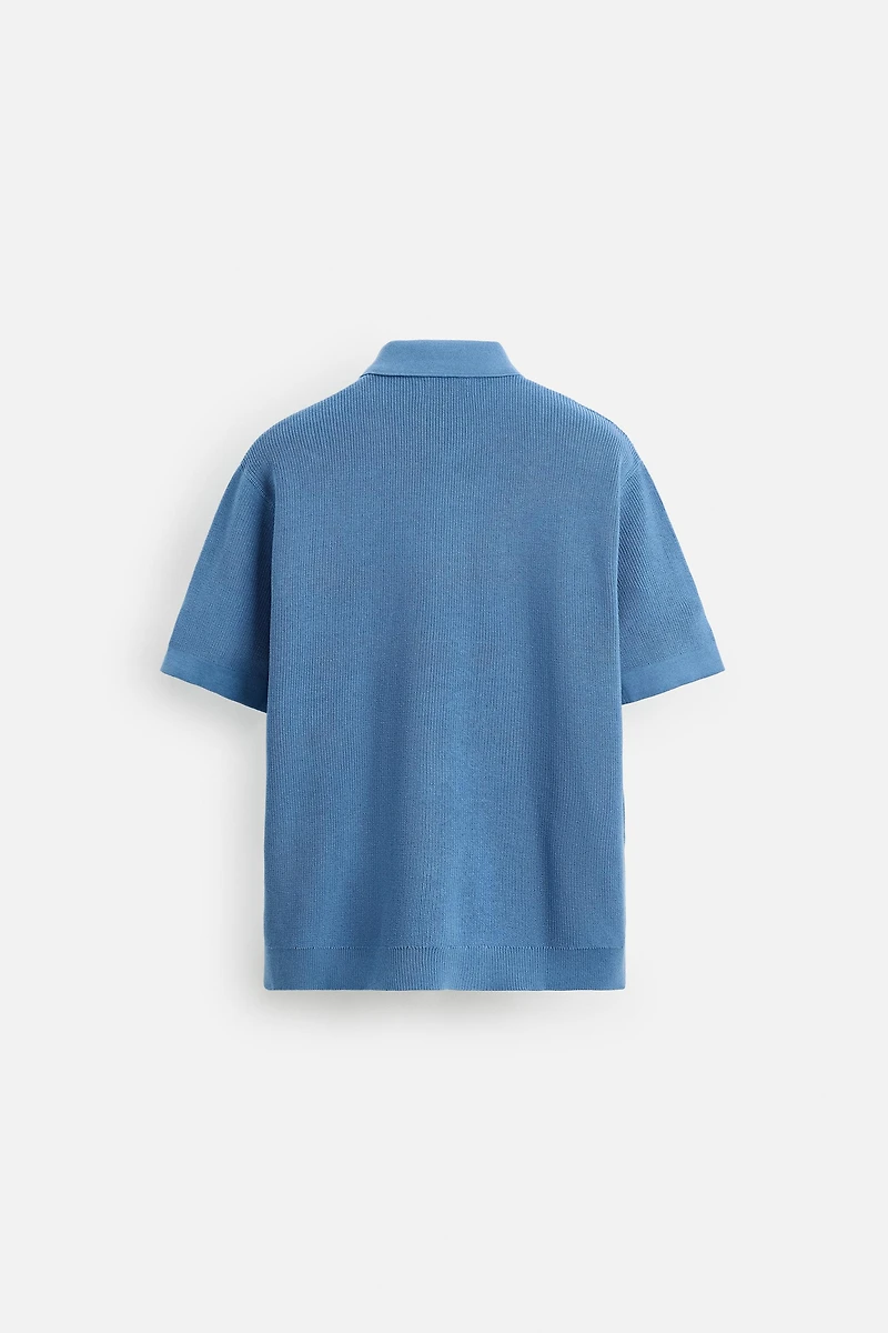 POLO EN MAILLE PERLÉE À ZIP