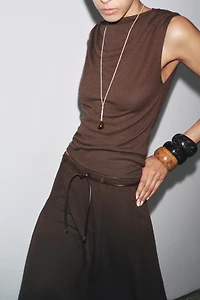 TOP EN MAILLE COUPÉ