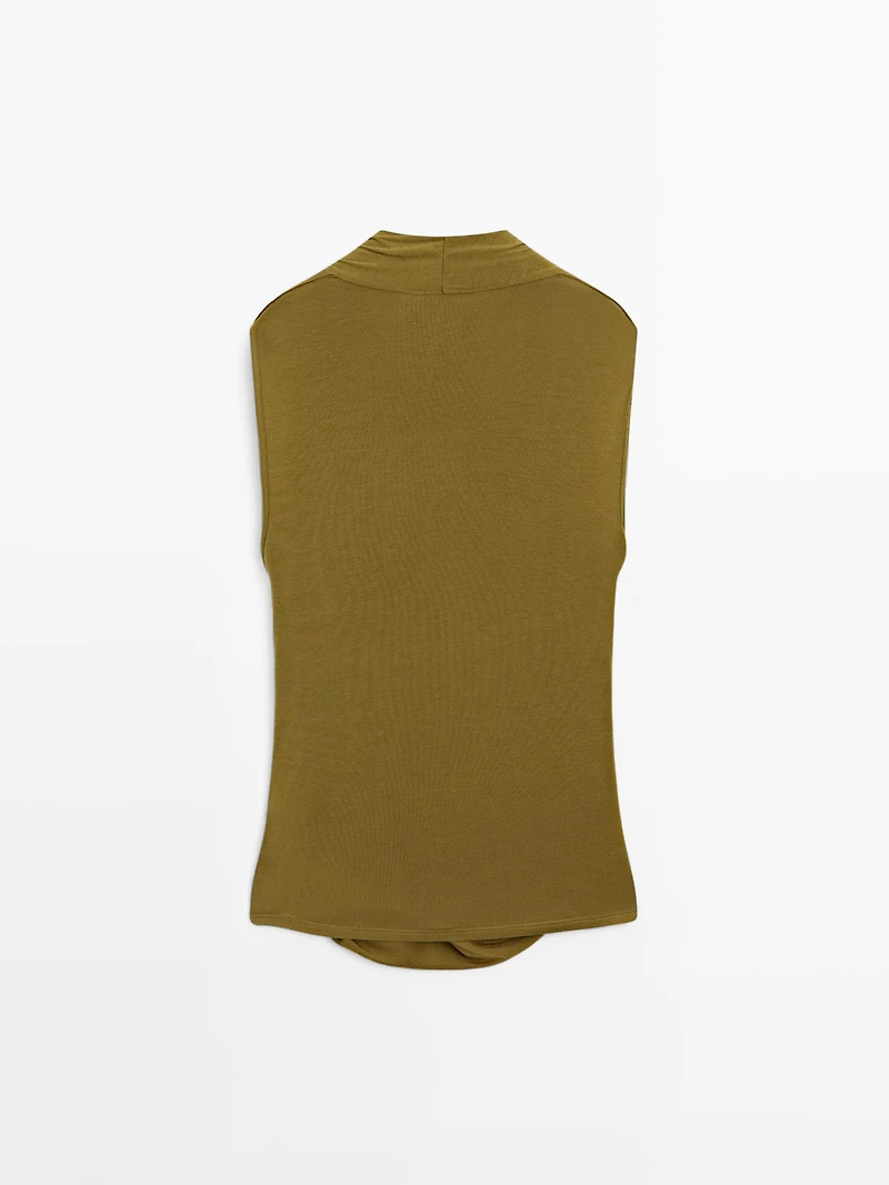 Draped top with surplice neckline
