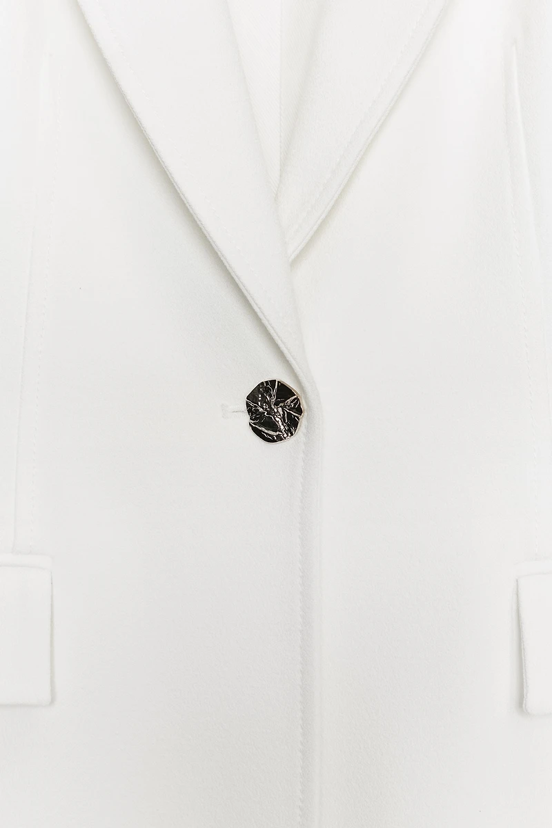 VESTE AJUSTÉE À ÉPAULETTES