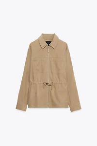VESTE À POCHES ET TAILLE AJUSTABLE