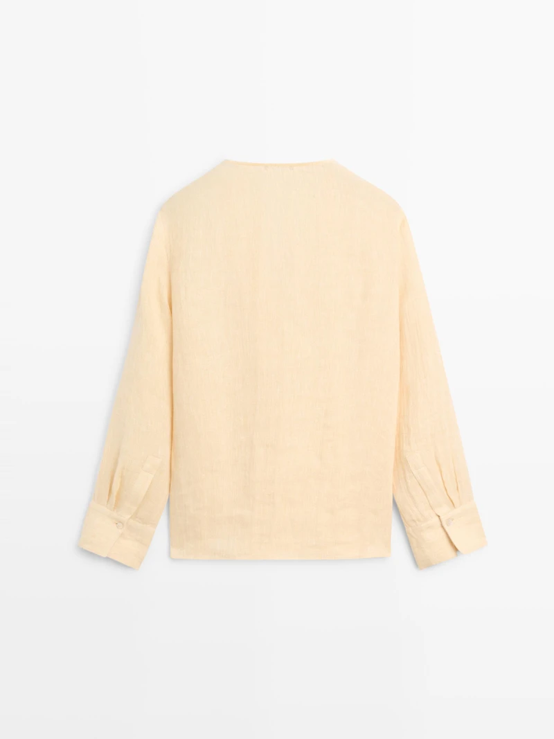 Flowing linen blouse with chest detail