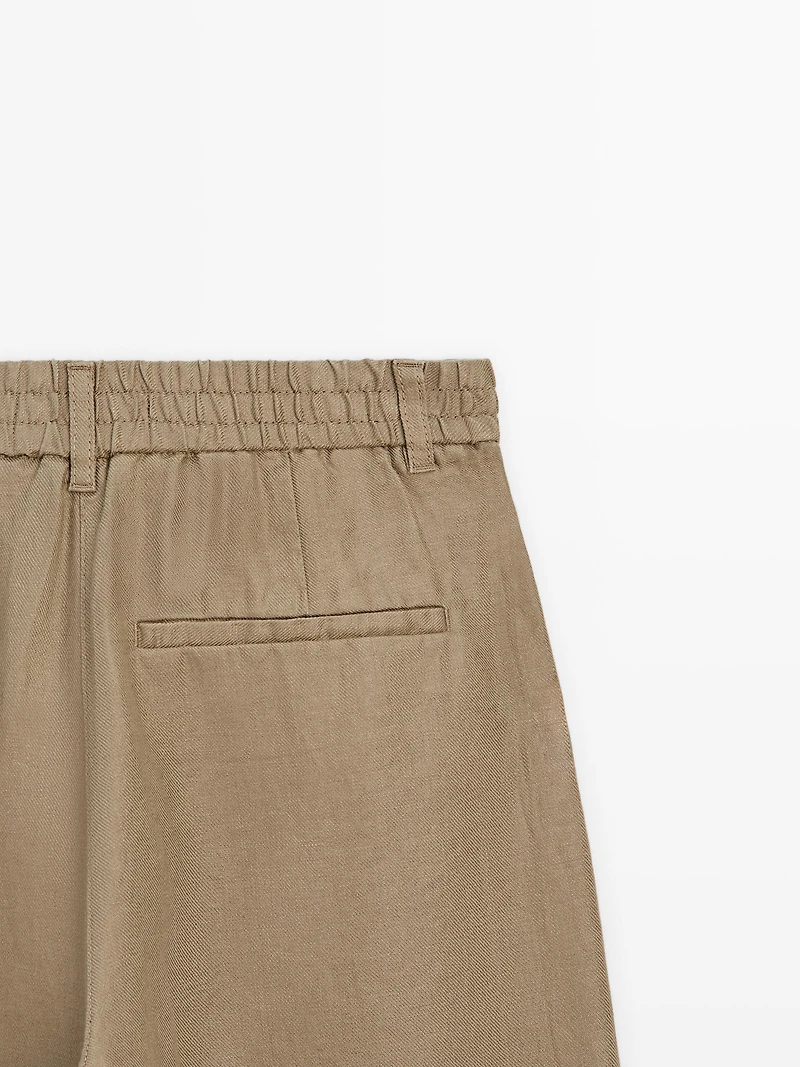100% linen wide-leg elasticated trousers