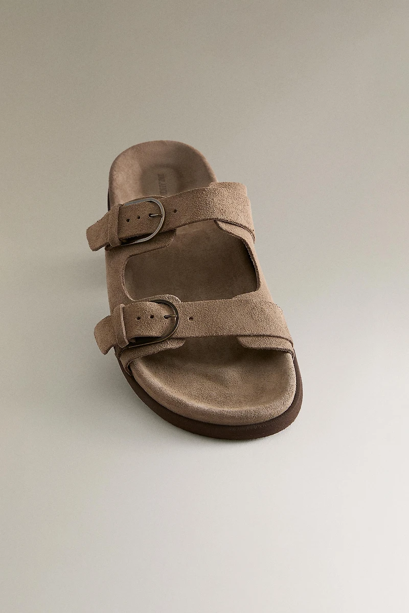 FLAT LEATHER SANDALS WITH BUCKLES