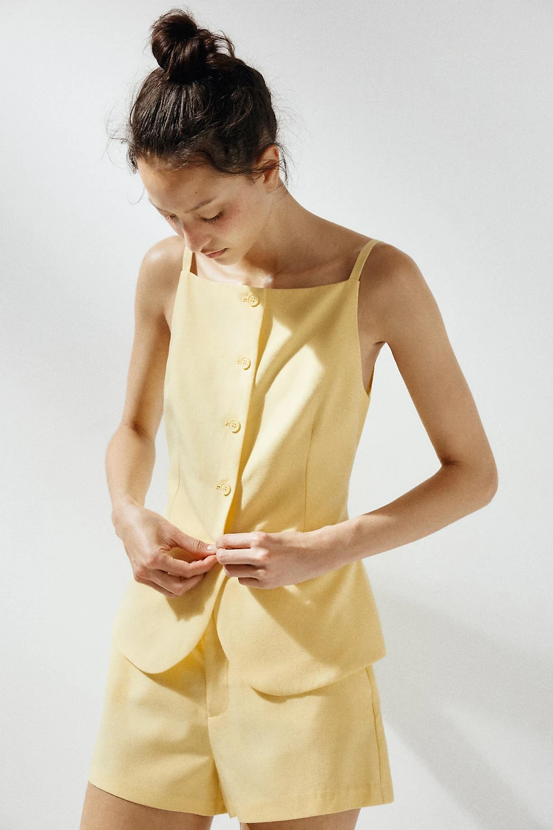 TOP GILET À BOUTONS