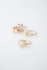 FOUR-PACK OF FLOWER AND HEART RINGS