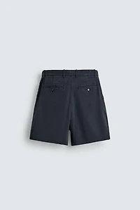 REGULAR FIT PLEATED CHINO SHORTS