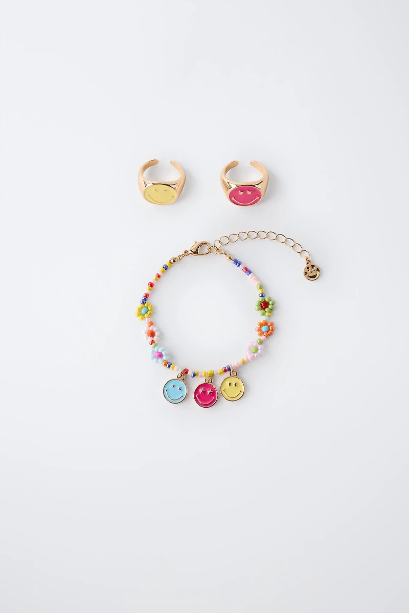 PACK OF RINGS AND BEADED BRACELET SMILEYWORLD ®