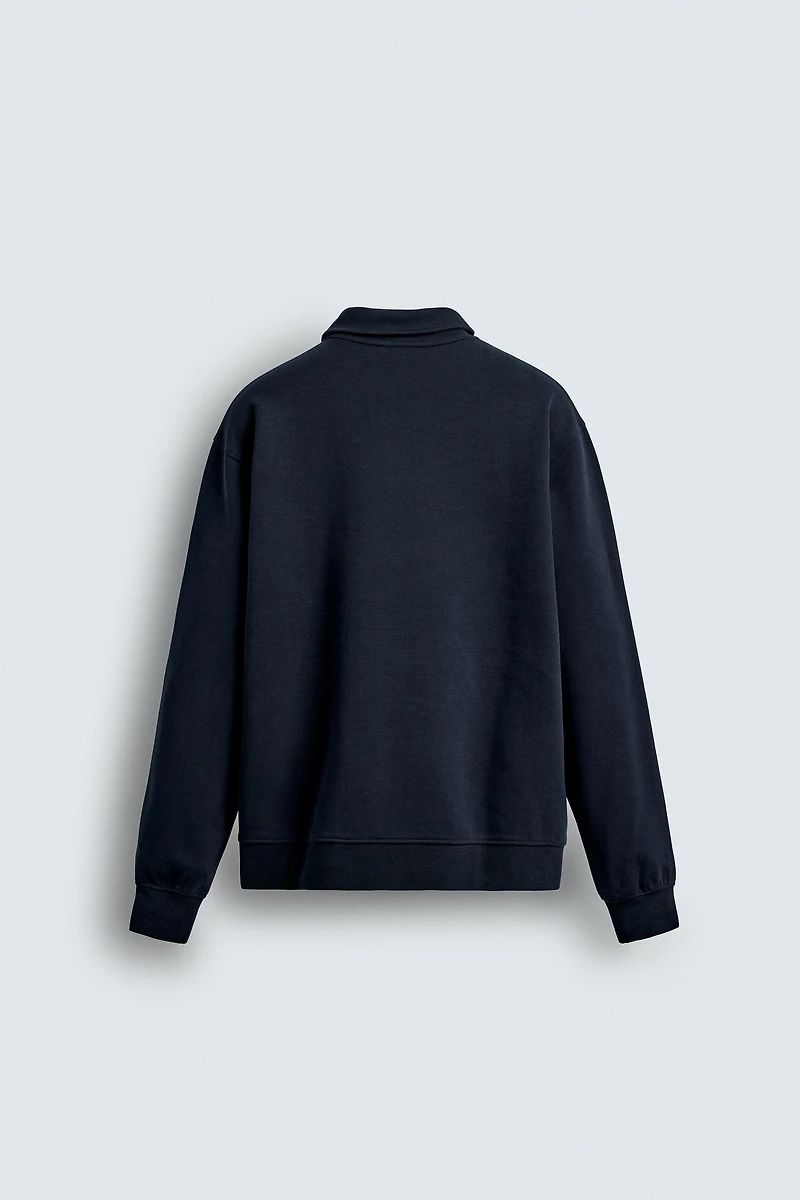 INTERLOCK ZIP POLO SWEATSHIRT