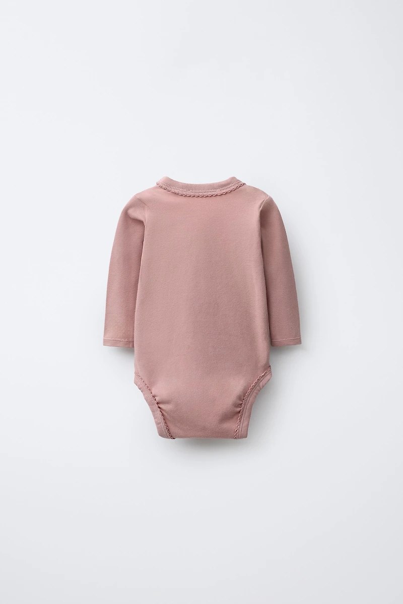 THREE-PACK OF KIMONO COLLAR FLORAL BODYSUITS