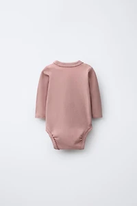 THREE-PACK OF KIMONO COLLAR FLORAL BODYSUITS