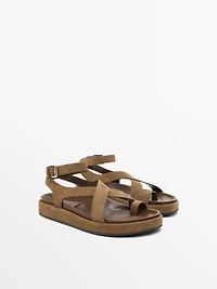 Sandals with crossover straps