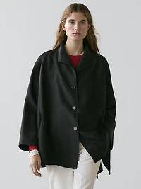 Flowing voluminous cape with button details