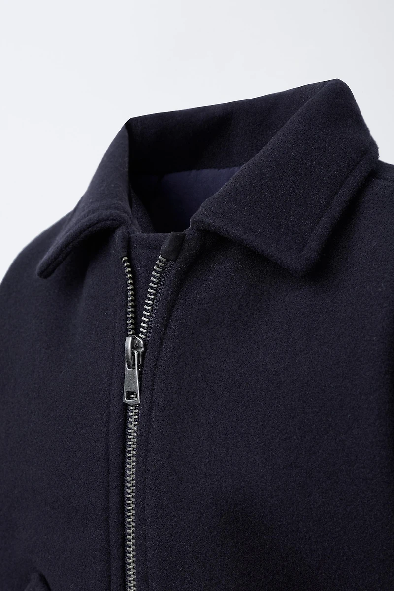 VESTE EN LAINE À POCHES