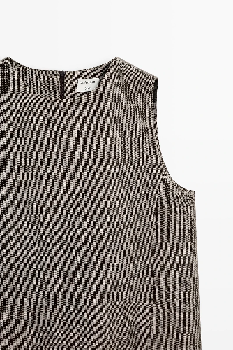 STUDIO textured top with cut-out details
