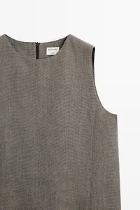 STUDIO textured top with cut-out details