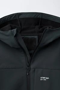 HOODED TECHNICAL JACKET