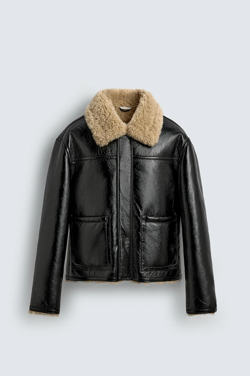 BLOUSON EN MATIÈRE SYNTHÉTIQUE DOUBLE FACE