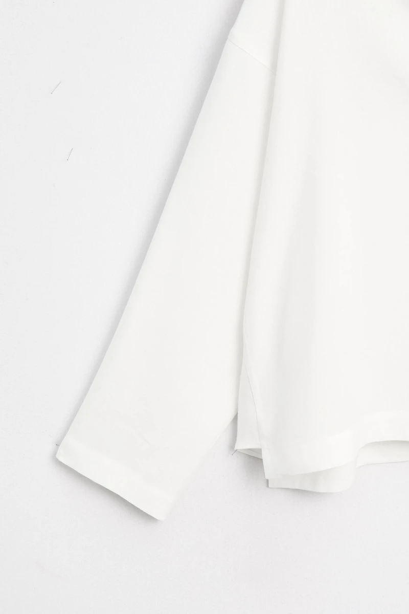 Flowing linen-blend V-neck shirt