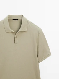 Polo micro-texture en piqué de coton