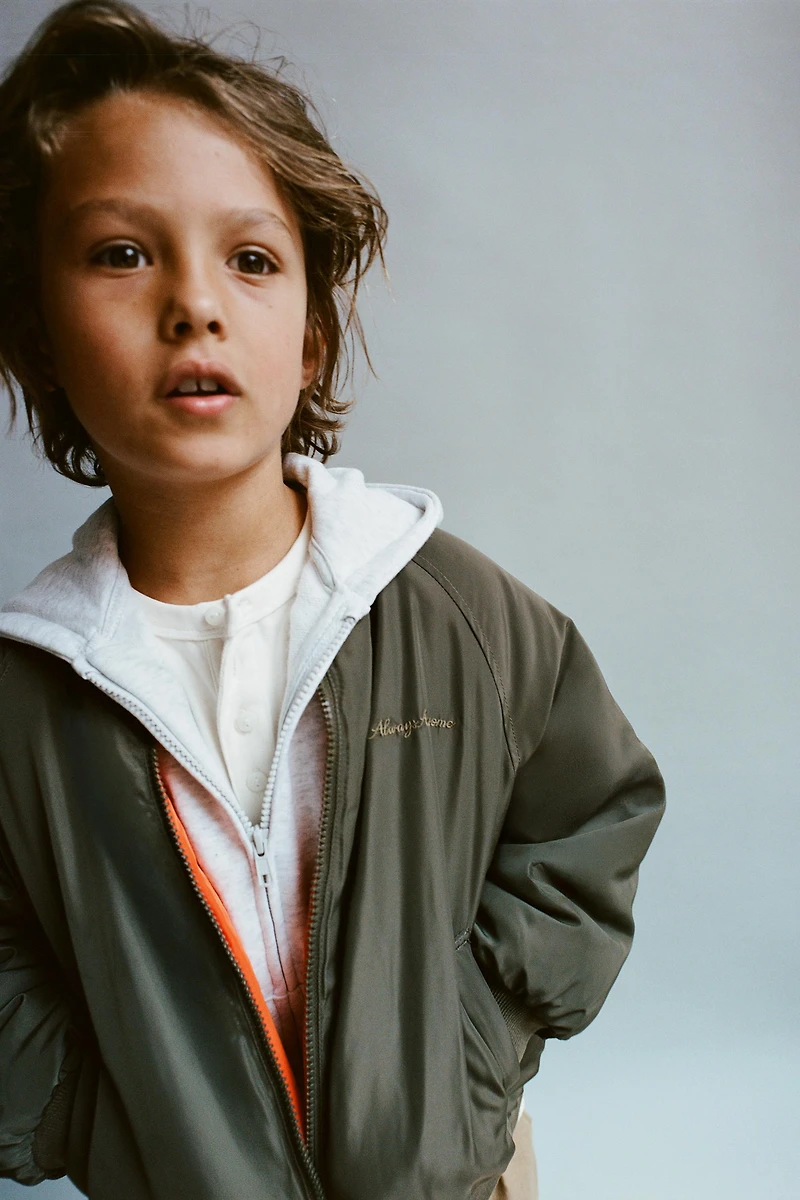 BLOUSON BOMBER À DOUBLURE CONTRASTÉE