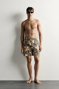 LONG FLORAL PRINT SWIM SHORTS