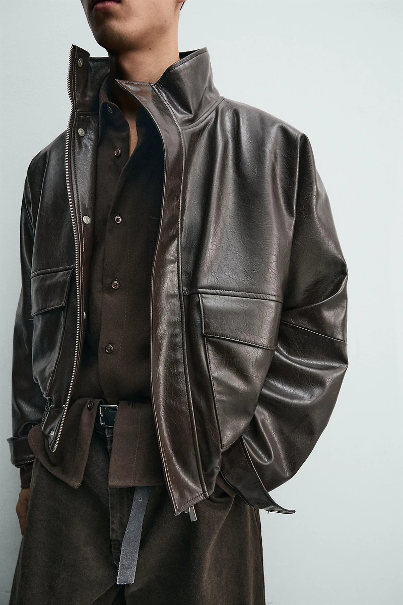 BLOUSON COURT MATIÈRE SYNTHÉTIQUE