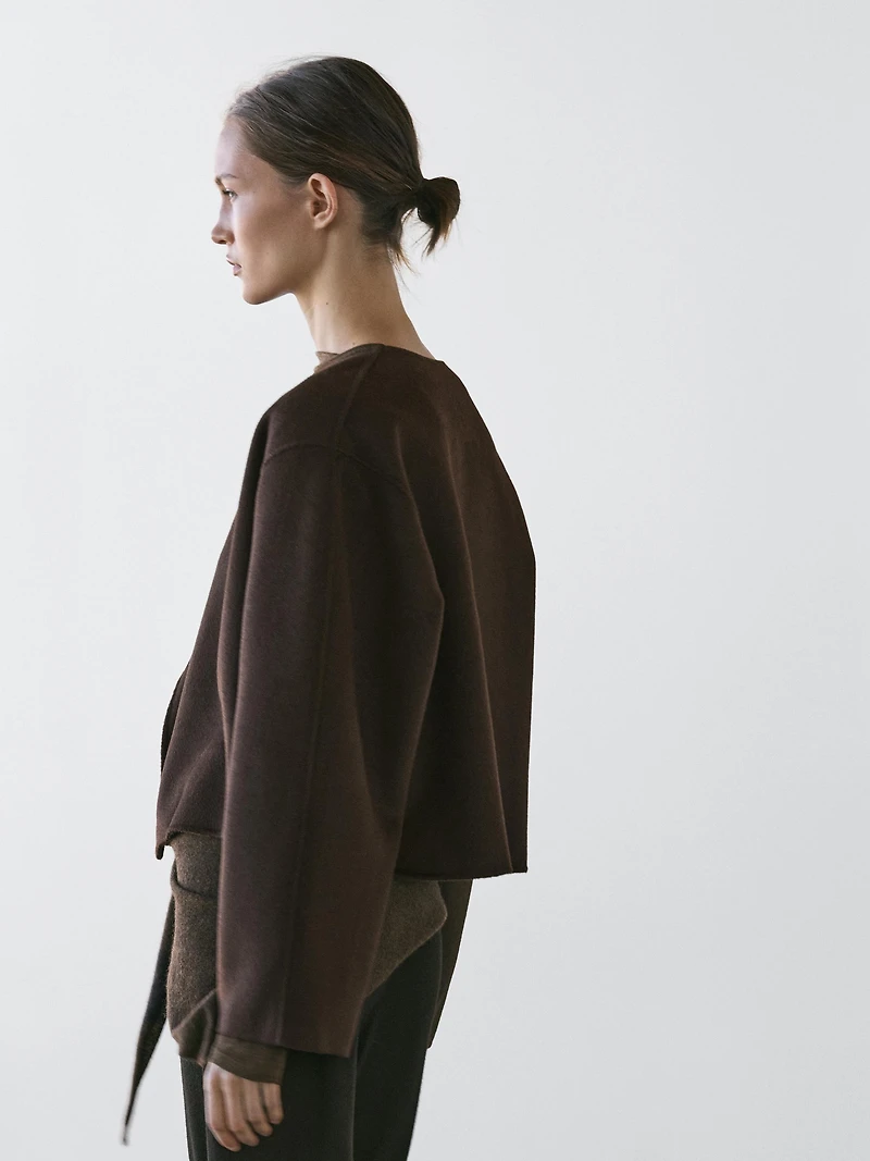 Short coat with rounded lapels