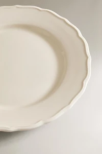 EARTHENWARE DINNER DISH WITH RAISED-DESIGN EDGE