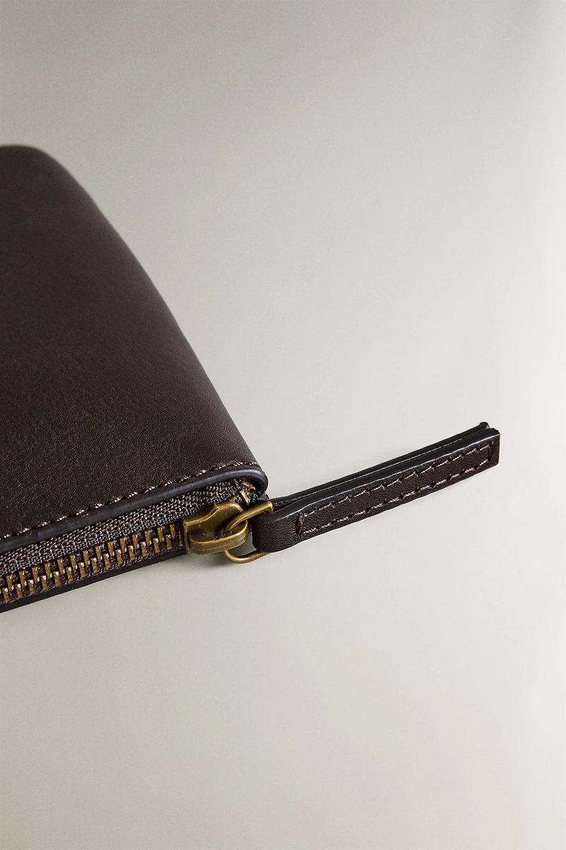LEATHER "EMERGENCY BAG" MAKEUP BAG