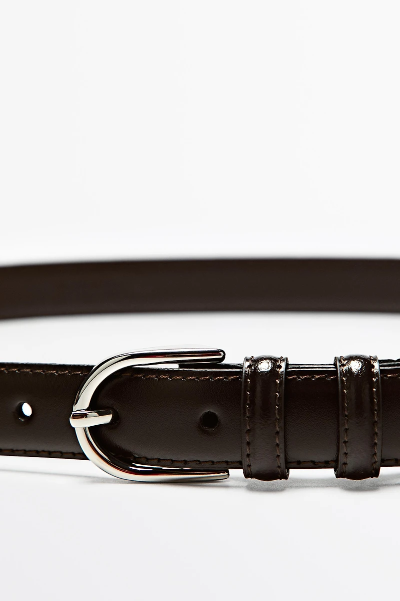 Nappa leather belt with topstitching and oval buckle