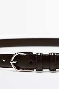 Nappa leather belt with topstitching and oval buckle