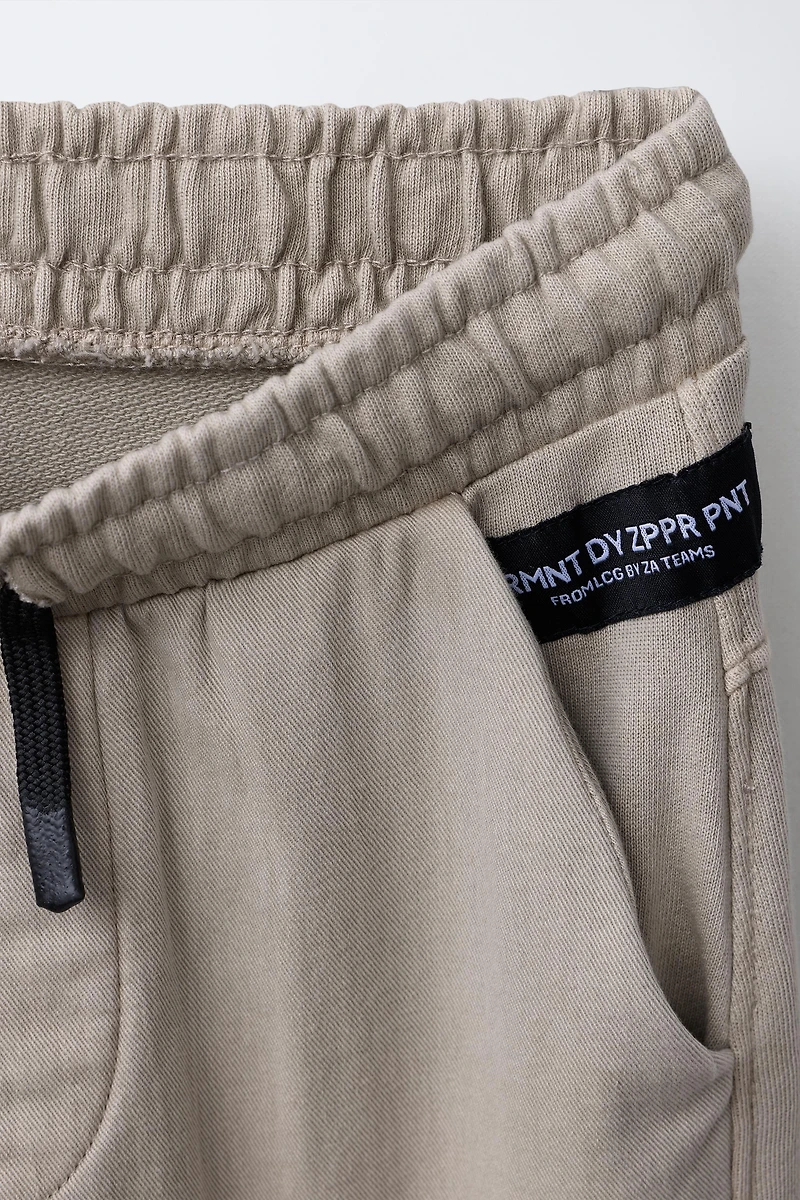 JOGGER PANTS WITH ZIPPERS