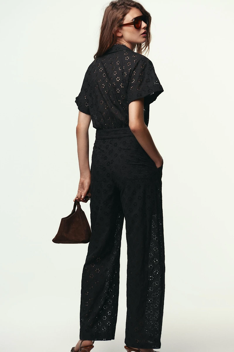EMBROIDERED EYELET BUCKLE JUMPSUIT