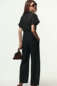 EMBROIDERED EYELET BUCKLE JUMPSUIT