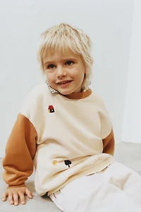 COLOR BLOCK EMBROIDERED SWEATSHIRT
