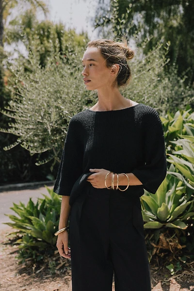 CUT OUT CAPE KNIT TOP