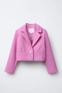 VESTE COURTE À BOUTONS