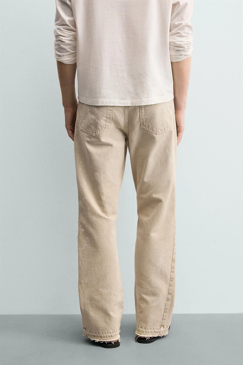 PAINT SPLATTER FLARE FIT JEANS