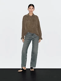 Blouse with zip on the chest