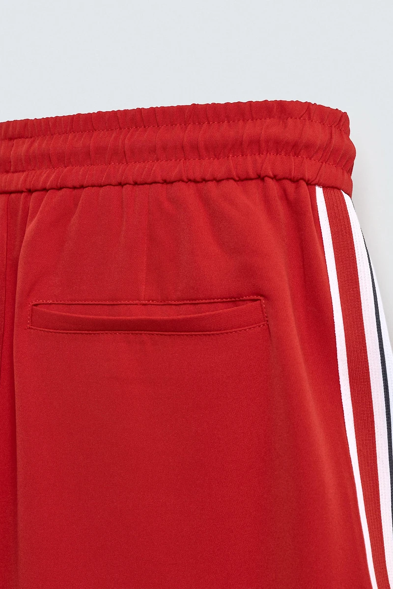 WIDE FIT JOGGER PANTS WITH SIDE STRIPES