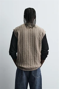 GILET EN TRICOT RÉVERSIBLE EFFET ENVERS