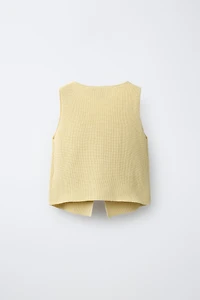TOP EN MAILLE À BOUTONS