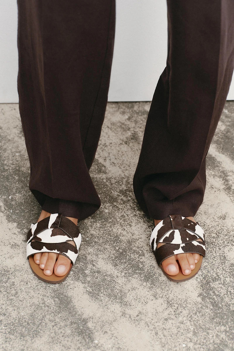 FLAT LEATHER SANDALS