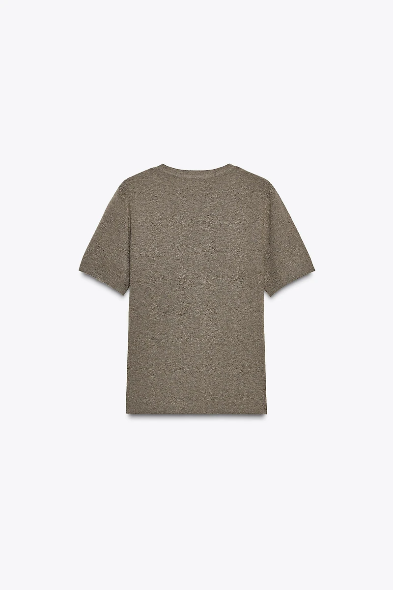 TOP EN MAILLE MANCHES COURTES AU TOUCHER DOUX