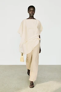 Asymmetric cape-style flowing blouse