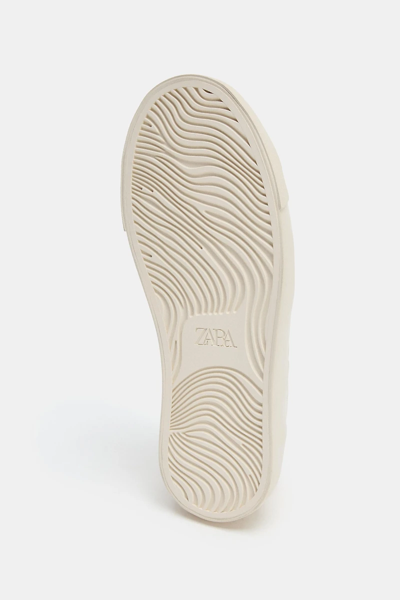 SNEAKERS WITH BACK DETAIL