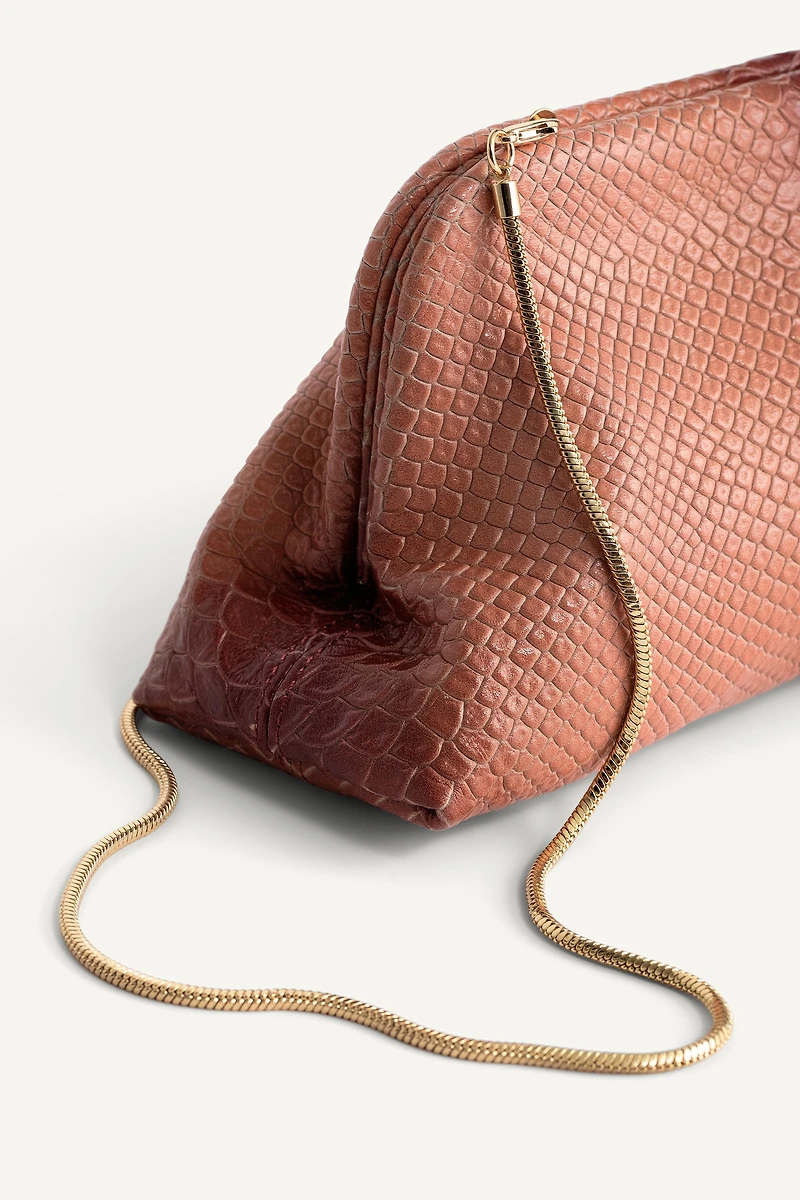 LIMITED EDITION EMBOSSED LEATHER POUCH