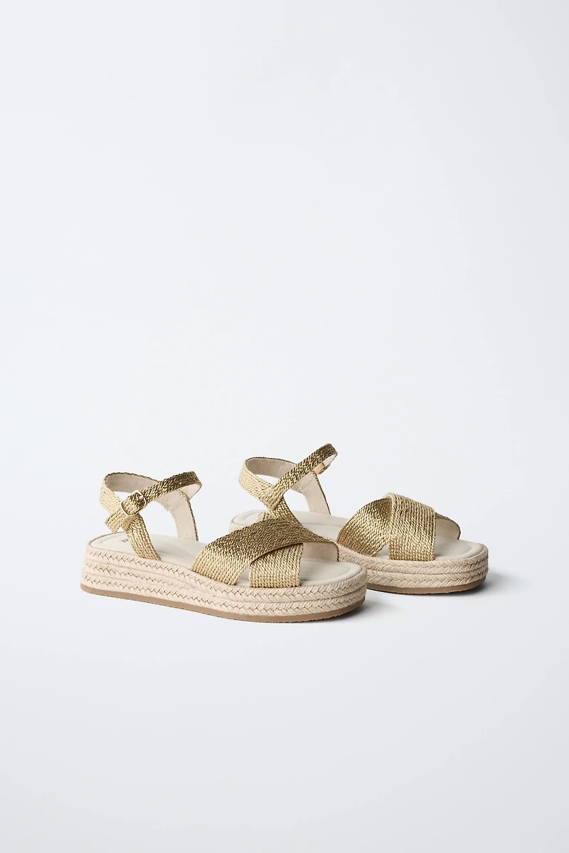 BRAIDED BODY SANDALS