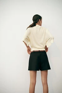 POLO EN MAILLE À MANCHES TROIS-QUARTS